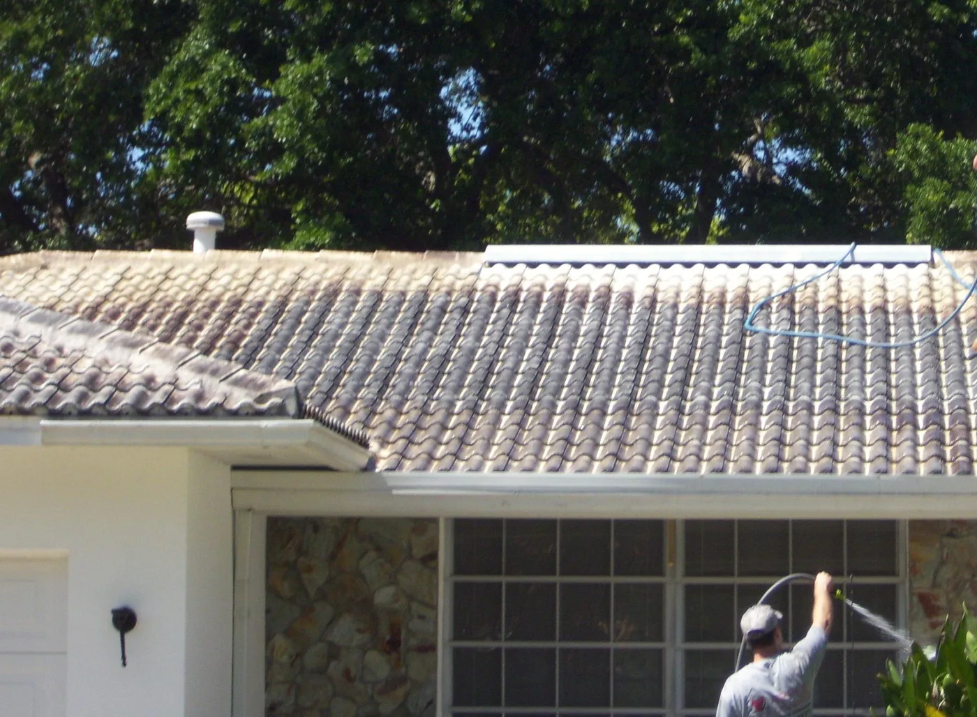 White tile roof before cleaning