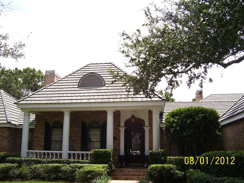 Tile roof over a home entry after cleaning